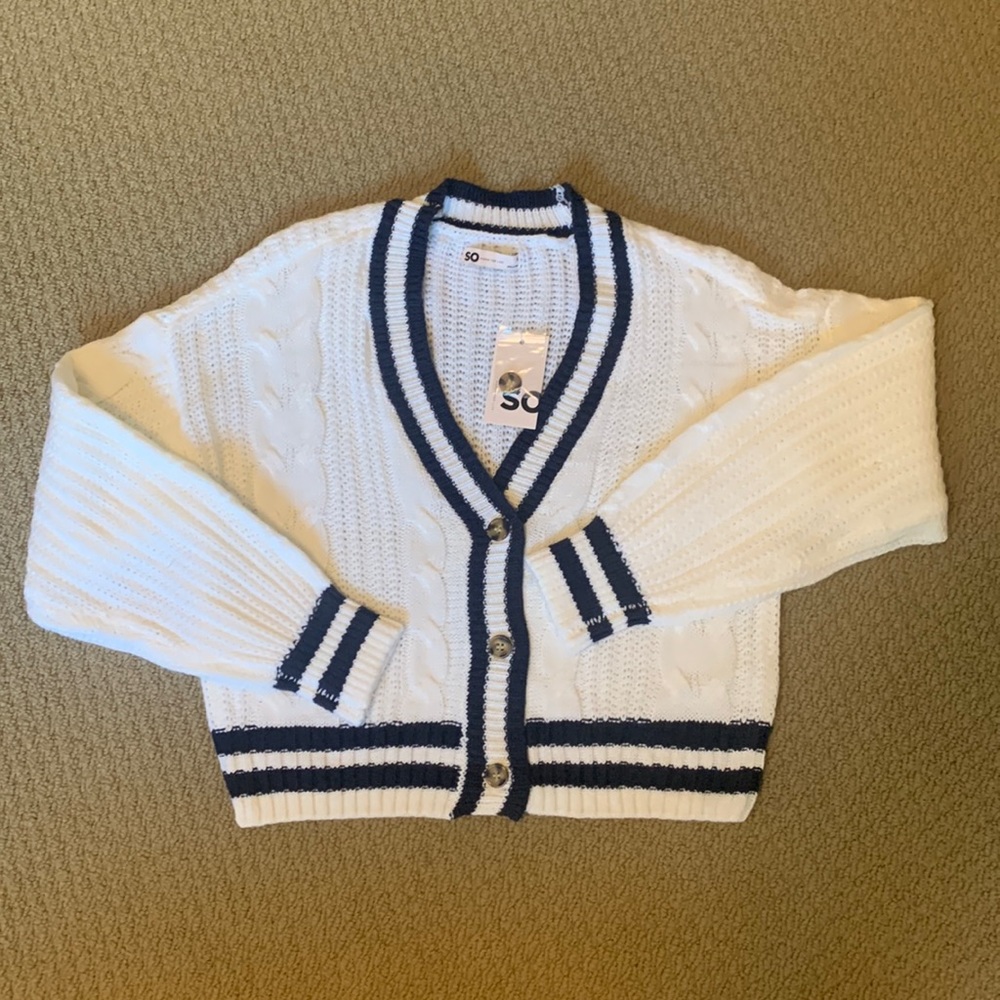 Cream crop v-neck cardigan sweater with navy blue accent stripes. New with tags!